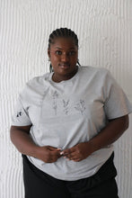 Load image into Gallery viewer, Large wildflower with doodle bee sleeve t-shirt