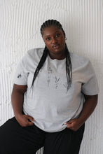 Load image into Gallery viewer, Large wildflower with doodle bee sleeve t-shirt