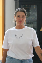 Load image into Gallery viewer, Dancing wildflower embroidered slogan organic t-shirt.