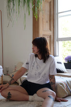 Load image into Gallery viewer, Large wildflower with doodle bee sleeve t-shirt