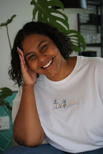 Load image into Gallery viewer, Floral colour block embroidered organic t-shirt.