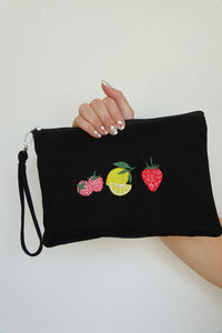 Canvas clutch bag in black with trio fruit embroidery
