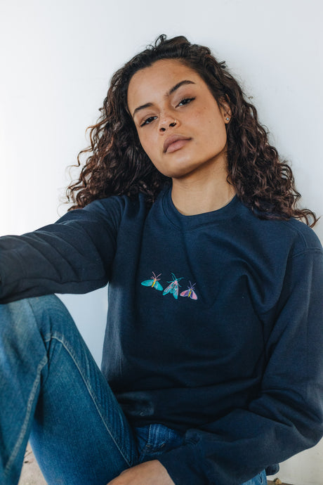 Embroidered trio of colourful moths sweater