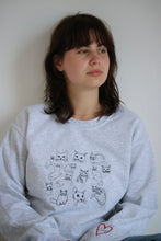 Load image into Gallery viewer, Cat doodle embroidered sweater with heart cat sleeve detail