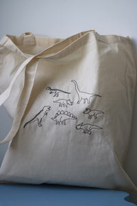 Lots of dinosaurs embroidered tote bag