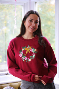 The Christmas bow wreath sweater