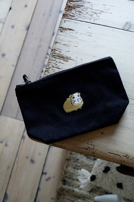 make up / accessory bag with cute embroidered design
