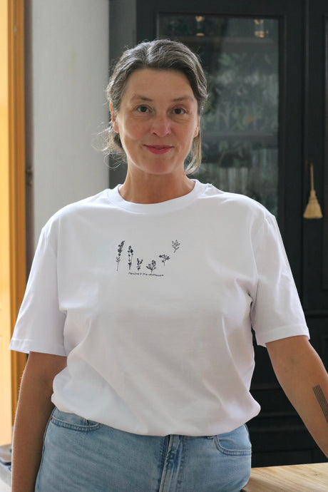 Dancing wildflower embroidered slogan organic t-shirt.