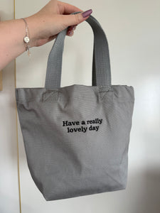 'Have a really lovely day' slogan Trinket bags