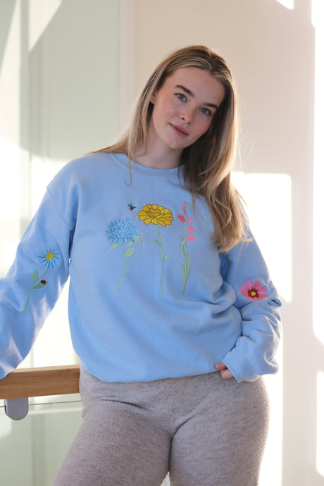 Floral sleeve with mini bugs Sweater