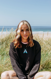 Embroidered colourful moth sweater