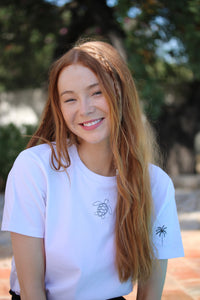 Turtle with palm tree sleeve embroidered organic t-shirt.