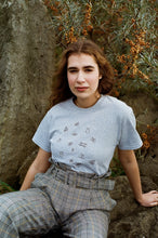 Load image into Gallery viewer, Lots of bugs embroidered organic t-shirt.