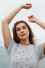 Load image into Gallery viewer, Lots of bugs embroidered organic t-shirt.