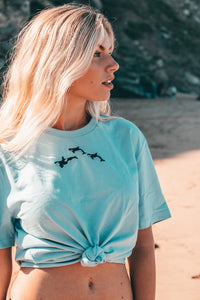 Trio of orca embroidered organic t-shirt.