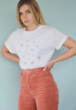 Load image into Gallery viewer, Lots of bugs embroidered organic t-shirt.