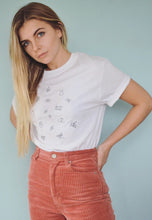 Load image into Gallery viewer, Lots of bugs embroidered organic t-shirt.