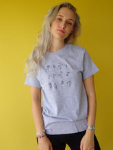 Load image into Gallery viewer, Floral embroidered organic t-shirt design