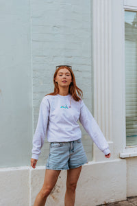 Embroidered trio of colourful moths sweater