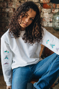embroidered trio of moths embroidered sleeve sweater