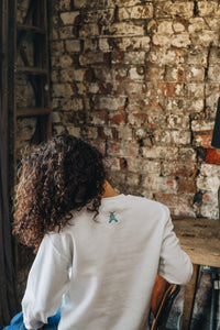 embroidered trio of moths embroidered sleeve sweater