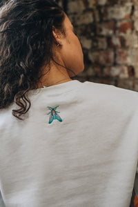 embroidered trio of moths embroidered sleeve sweater