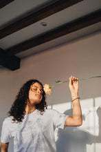 Load image into Gallery viewer, Trio of big roses with doodle bee sleeve embroidered organic t-shirt.