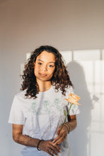 Load image into Gallery viewer, Trio of big roses with doodle bee sleeve embroidered organic t-shirt.