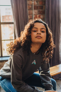 Embroidered colourful moth sweater