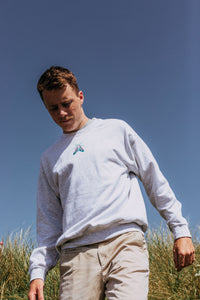 Embroidered colourful moth sweater
