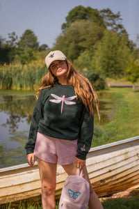 The fancy Holographic dragonfly embroidered on the front sweater
