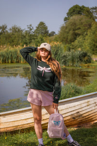 The fancy Holographic dragonfly embroidered on the front sweater
