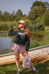 The fancy Holographic dragonfly embroidered on the front sweater