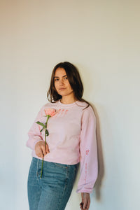 Embroidered rose sweater with sleeve details