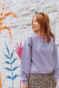 Embroidered colourful moth sweater