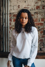 Load image into Gallery viewer, Embroidered tattoo style sweater with sleeve details