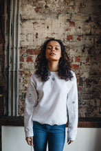 Load image into Gallery viewer, Embroidered tattoo style sweater with sleeve details
