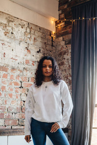 Embroidered tattoo style sweater with sleeve details