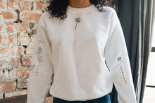 Load image into Gallery viewer, Embroidered tattoo style sweater with sleeve details