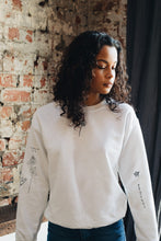 Load image into Gallery viewer, Embroidered tattoo style sweater with sleeve details