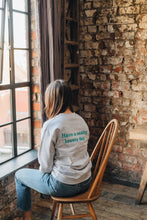 Load image into Gallery viewer, Embroidered have a really lovely day back sweater with reminder sleeve