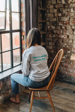 Load image into Gallery viewer, Embroidered have a really lovely day back sweater with reminder sleeve