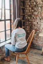 Load image into Gallery viewer, Embroidered have a really lovely day back sweater with reminder sleeve