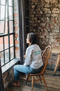 Embroidered have a really lovely day back sweater with reminder sleeve