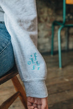 Load image into Gallery viewer, Embroidered have a really lovely day back sweater with reminder sleeve