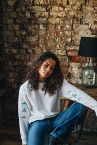 embroidered trio of moths embroidered sleeve sweater