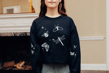 Load image into Gallery viewer, festive bugs embroidered sweater with bug star sleeve detail