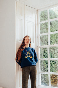 Embroidered large festive moth sweater