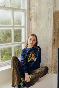 Embroidered large festive moth sweater