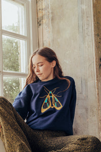 Embroidered large festive moth sweater
